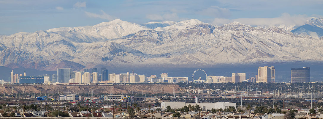 Snow-Capped Mountains Behind Las Vegas Skyline in December